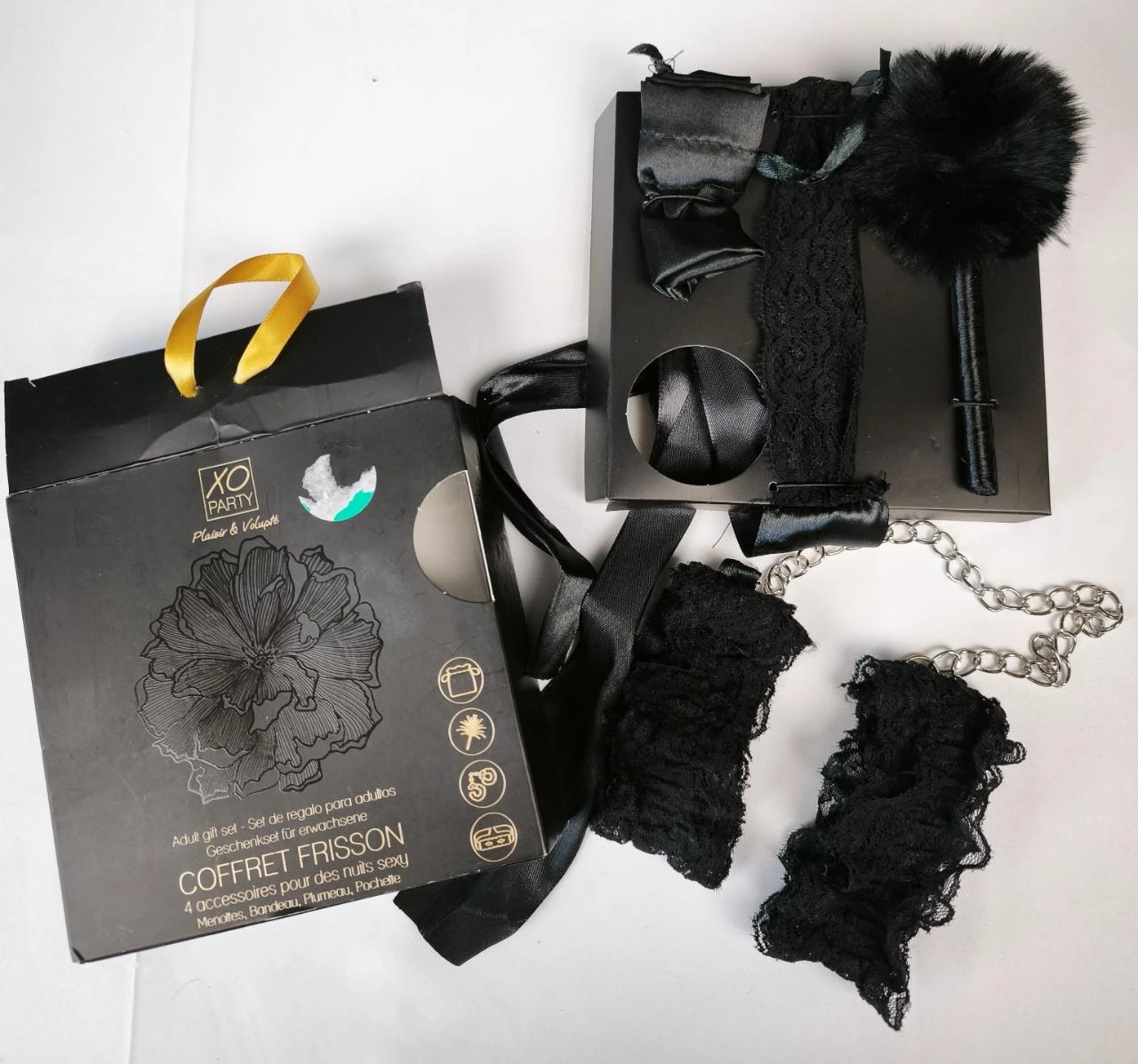 Partager Coffret coquin pour couple / 4 accessoires /Neuf.